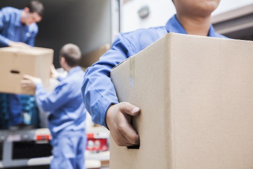 Man With Van Brent team sorting recyclable items during a sustainable move