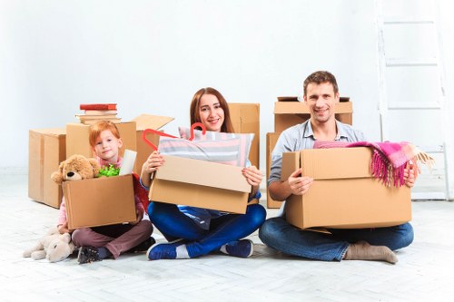 Local office movers handling desks and chairs in Brent