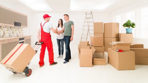Packed household items ready for transport in Brent