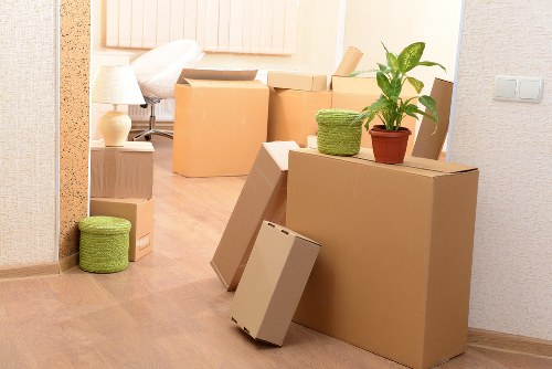 Packed boxes and furniture prepared for collection in Brent